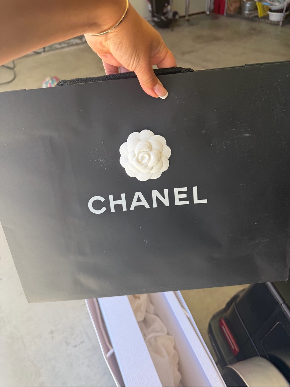 CHANEL Black Shopping Bag and magnetic box 
with White Camellia Accent
